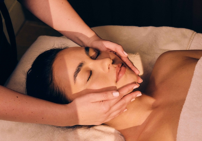 A rejuvenating massage on the rooftop of Aria Hotel Budapest with a gorgeous city background.