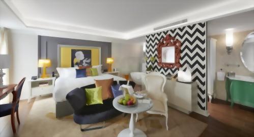 Bold colors and whimsical elements in our Rolling Stones inspired Signature Room.