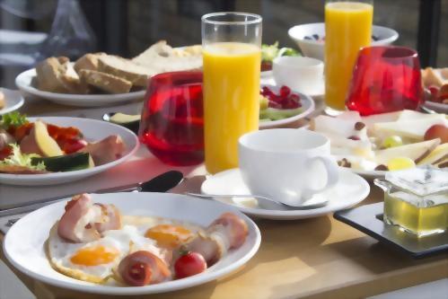 A complimentary, breakfast buffet is served daily in the Music Garden Courtyard.