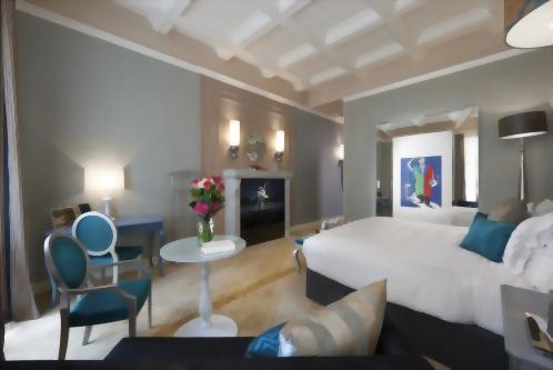 The rooms feature a sofa bed, a lacquered French Style Writing Table, a marble bistro table and chairs