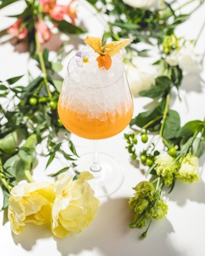 Ambrosia Cocktail at our the High Note SkyBar, which is made a divine drink by the mutual love of mango, passion fruit and honey water and the elegance of dry, fine sherry made by maturing in oak barrels.